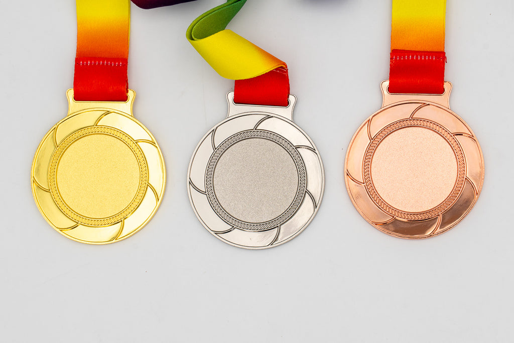 Medalles amb aspes sense color al voltant de la zona central.