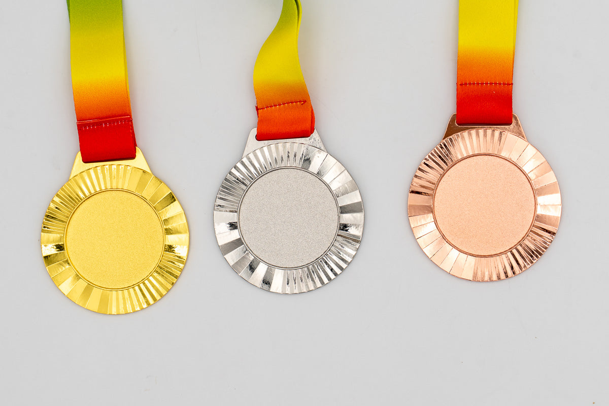 Medalles amb relleu de raigs radials, model 3.
