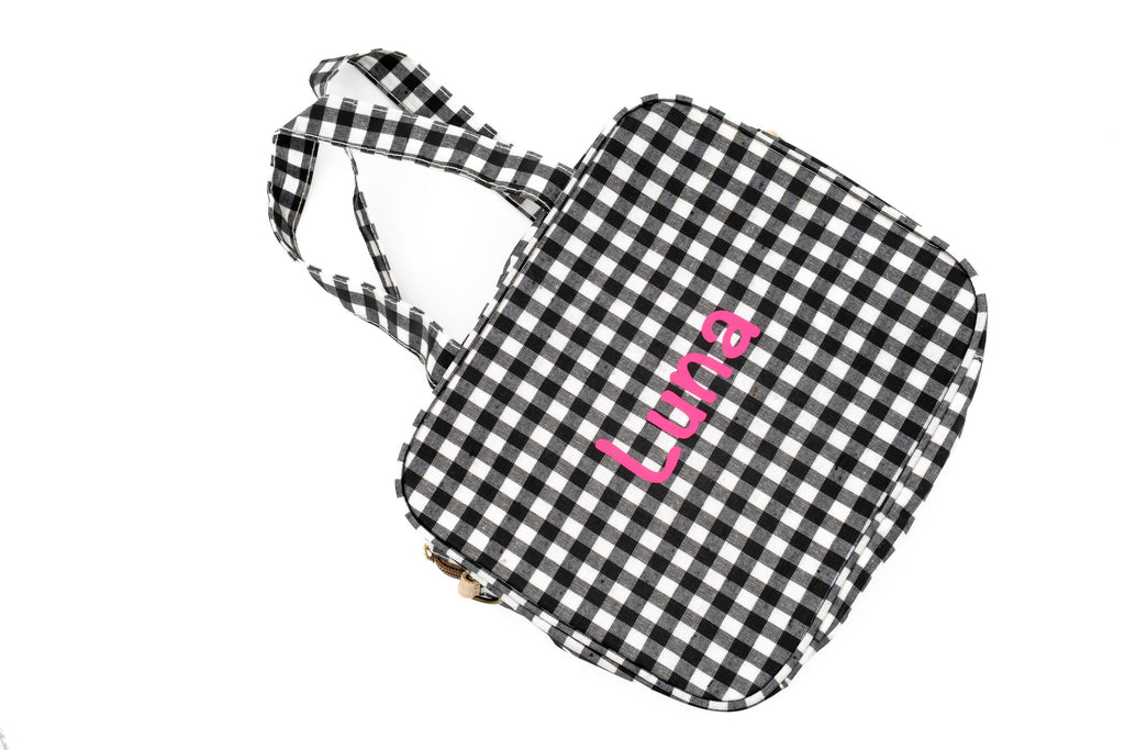 Bossa de canvi de vichy negre amb el nom Luna en vinil rosa