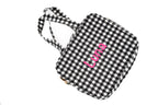 Bossa de canvi de vichy negre amb el nom Luna en vinil rosa