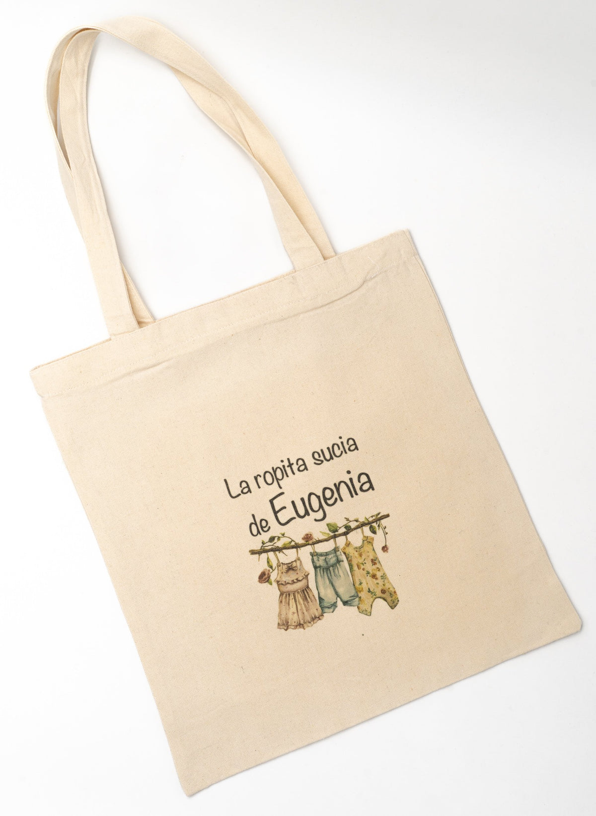 Bossa tote amb «La ropita sucia de Eugenia» penjant de les nanses