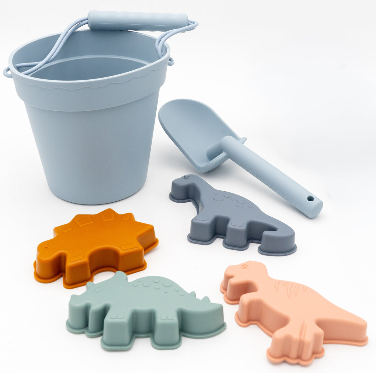 Conxunto de praia azul ceo con caldeiro, pa e moldes de dinosauros de silicona flexible.