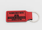 Clauer rectangular vermell amb text i disseny de lloguer de vehicles.