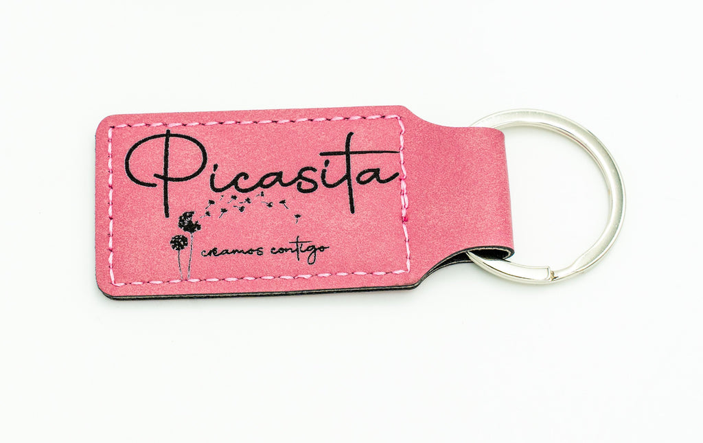 Clauer rectangular rosa amb logotip fosc de Picasita.