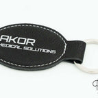 Ovalado 58x40 mm / Negro - Plata