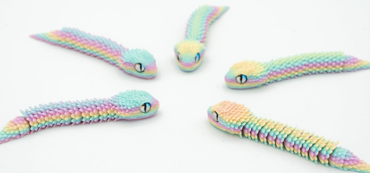 Serpes 3D articuladas en cores pastel