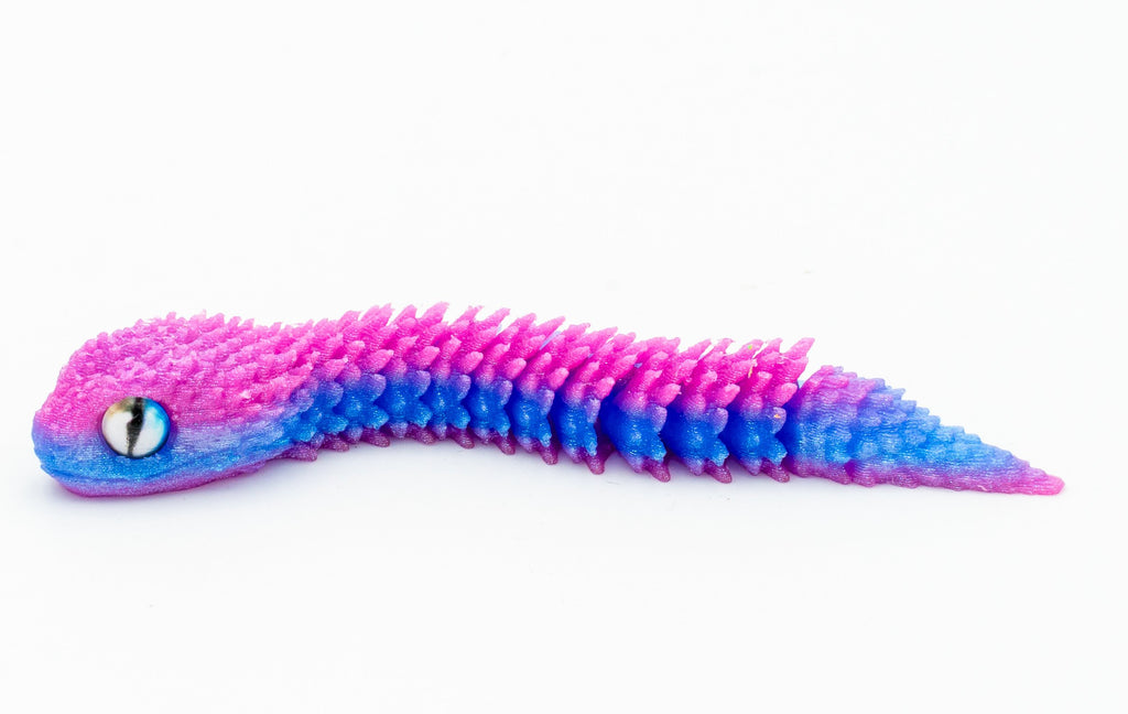 Serpe 3D articulada en degradado rosa, morado e azul
