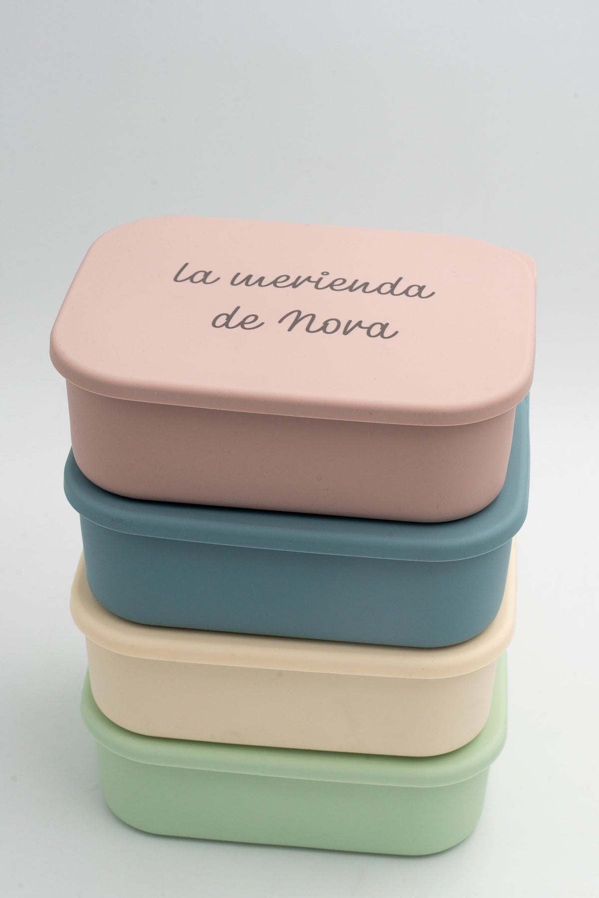 Tàpers XL de silicona i acer apilats en diversos colors