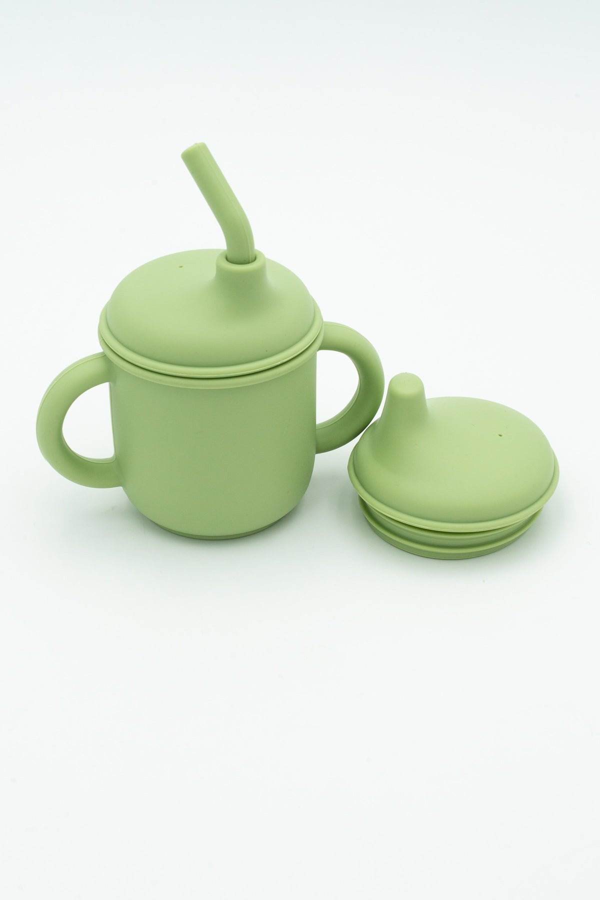 Vaso verde con palliña e tapa con bico para beber