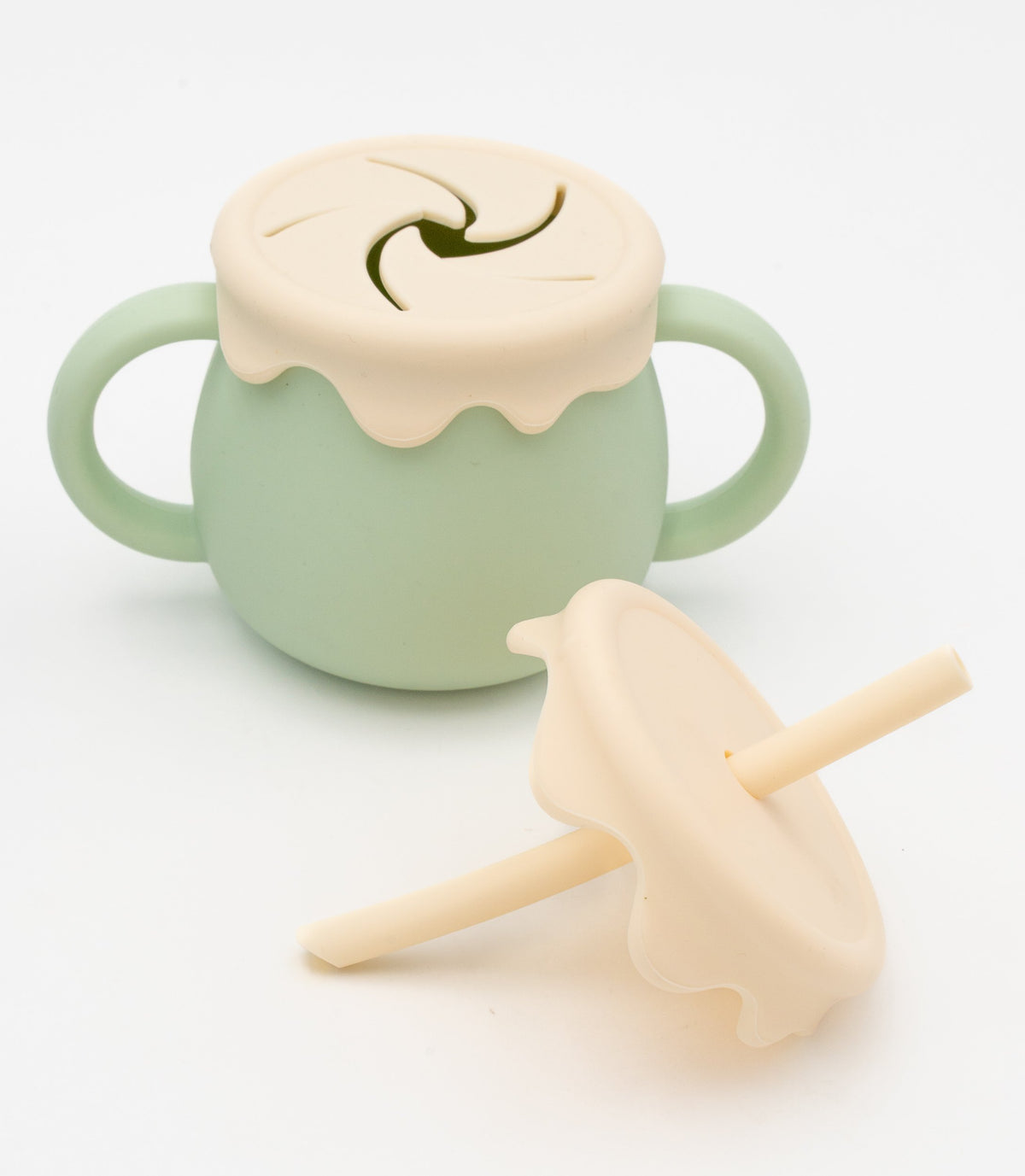 Vaso verde claro coa tapa segmentada posta e tapa para palliña separada